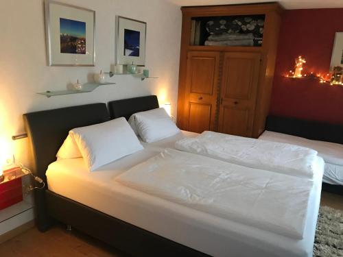 Ліжко або ліжка в номері Haus Cäcilia