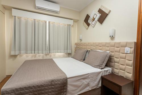Cama ou camas em um quarto em Hotel Marbor