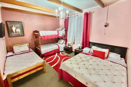 מיטה או מיטות בחדר ב-Hotel de Talca