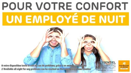 a poster of a man and a woman with their hands on their faces at Premiere Classe Nancy Est Essey in Essey-lès-Nancy