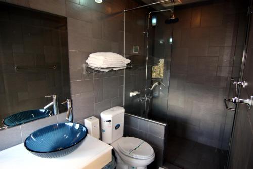 Un baño de Margaret Garden Villa