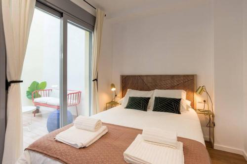 Posteľ alebo postele v izbe v ubytovaní TGH/ Málaga center luxury style