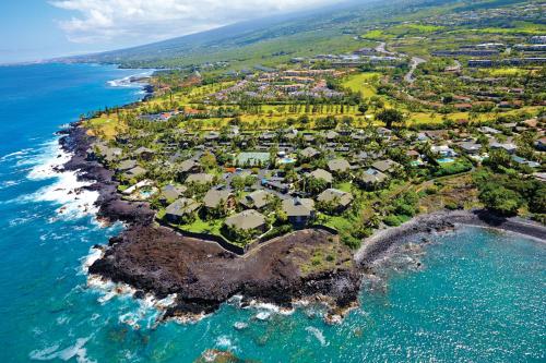 an aerial view of a resort on a island in the ocean at Castle Kanaloa at Kona in Kailua-Kona