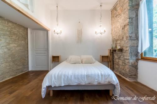 Ένα ή περισσότερα κρεβάτια σε δωμάτιο στο Cosy a la campagne