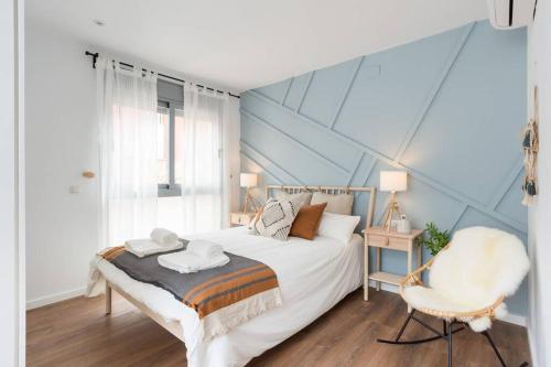 A bed or beds in a room at TGH/ Málaga center western style