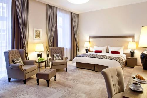 Posteľ alebo postele v izbe v ubytovaní Metropolitan Boutique Hotel