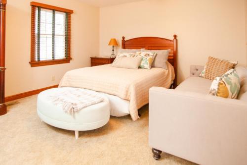 Un pat sau paturi într-o cameră la Millsite Lodge