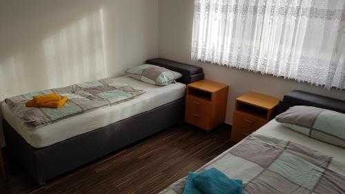 Postel nebo postele na pokoji v ubytování Ferienwohnung Regina