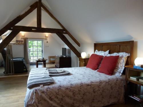 Llit o llits en una habitació de Le Grand Saint-Marc