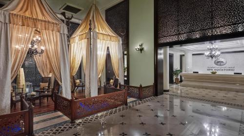 a room with curtains and a stage in a building at Crowne Plaza Kuwait Al Thuraya City by IHG in Kuwait