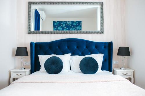 En eller flere senge i et værelse på Penthouse Evianne Faleza