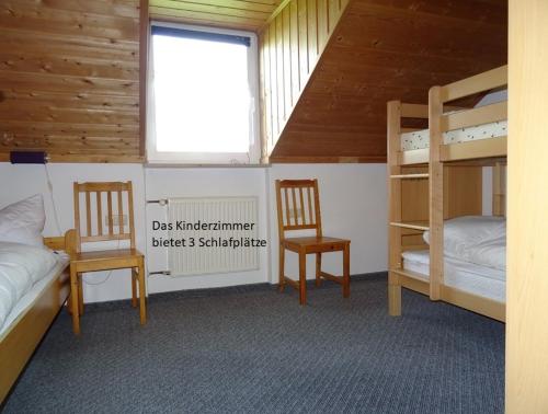 Ferienhäuser Schlossbergにあるベッド