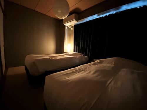 Ένα ή περισσότερα κρεβάτια σε δωμάτιο στο Randor Residence Tokyo Classic