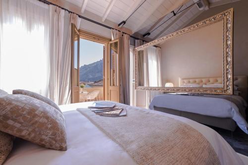 Posteľ alebo postele v izbe v ubytovaní Castellano Hotel & Suites