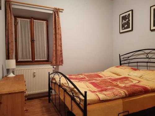 Postel nebo postele na pokoji v ubytování Apartmán Bedřichov