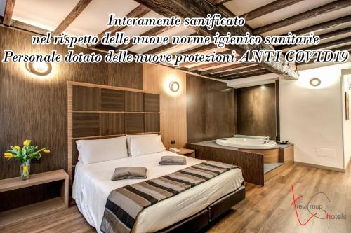 Cama ou camas em um quarto em Hotel Trevi - Gruppo Trevi Hotels