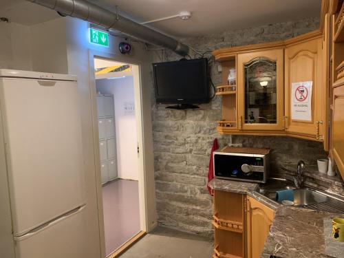Kuchyň nebo kuchyňský kout v ubytování Süda Hostel