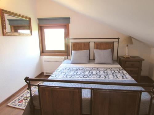 A bed or beds in a room at Quinta Sobral Prestige - Rustic House
