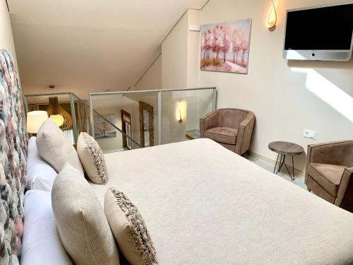 Akla Hotel Méridaにあるテレビまたはエンターテインメントセンター