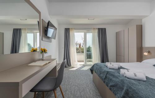 Кровать или кровати в номере Villa Ladavac B&B