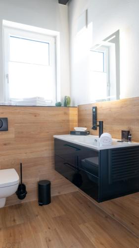 Ένα μπάνιο στο LÜTTES LOFT Boutique Hotel