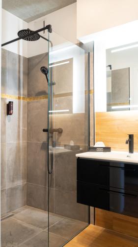 Ένα μπάνιο στο LÜTTES LOFT Boutique Hotel