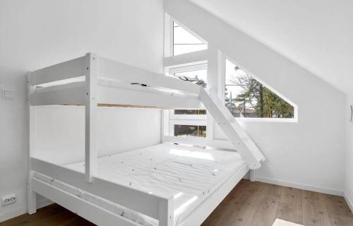เตียงในห้องที่ Årostunet 3