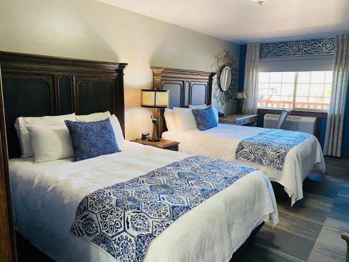 Letto o letti in una camera di Desert Rose Resort & Cabins