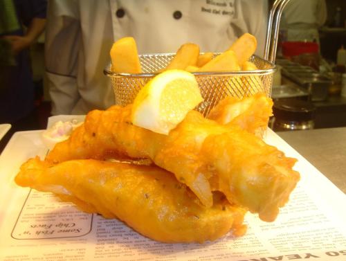 a plate of food with fish and french fries at Kilcamb Lodge Hotel in Strontian