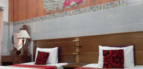 Ένα ή περισσότερα κρεβάτια σε δωμάτιο στο Homstay Thanh Sơn