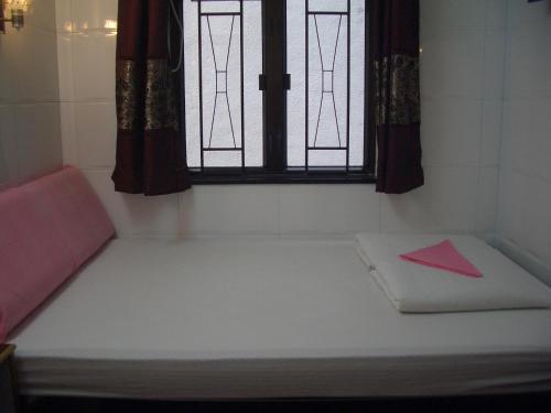 Cama o camas de una habitación en Sun Shine Guest House