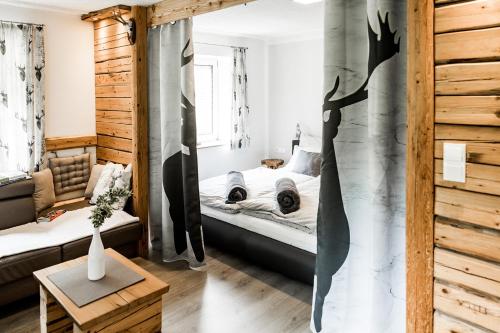 Voodi või voodid majutusasutuse Ferienhaus Hirschnest toas
