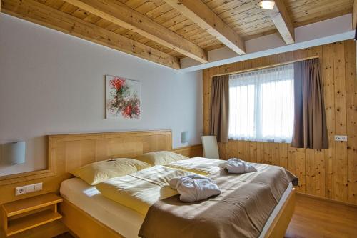 Postel nebo postele na pokoji v ubytování Apartment Dahoam