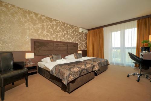 Ένα ή περισσότερα κρεβάτια σε δωμάτιο στο HOTEL CENTRUM with free parking