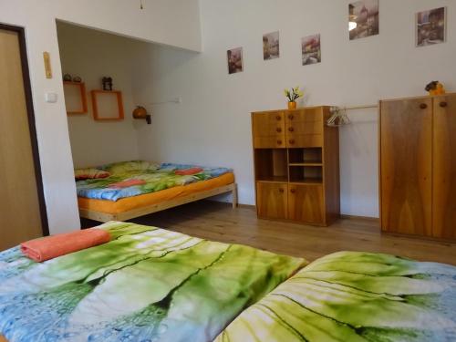 Postel nebo postele na pokoji v ubytování Ubytovani Dana Brentnerova
