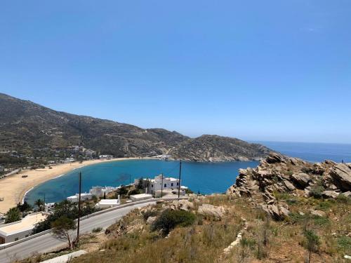 a view of a beach and a road at Almyriki in Mylopotas