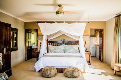 Krevet ili kreveti u jedinici u objektu African Safari Lodge