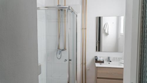 a bathroom with a shower and a sink at Hotel Aguere in La Laguna