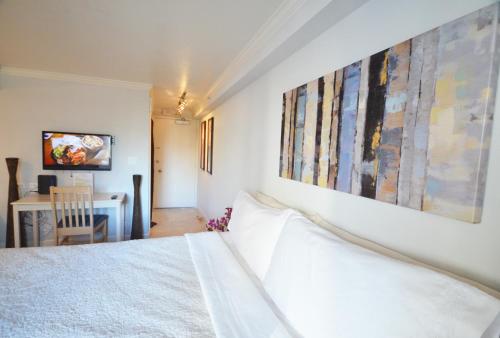 Ένα ή περισσότερα κρεβάτια σε δωμάτιο στο KV1009 Waikiki 2463 Kuhio Ave Honolulu