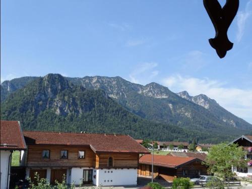 a mountain view of a town with houses and mountains at Ferienwohnung Anna in Inzell