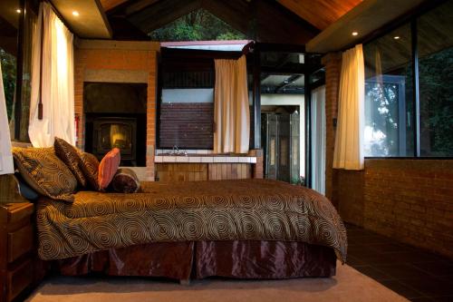 Un ou plusieurs lits dans un hébergement de l'établissement Altura Hotel