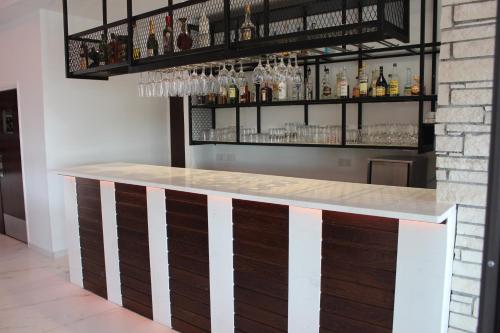 Ο χώρος του lounge ή του μπαρ στο Petsas Apartments