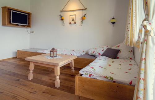 Posteľ alebo postele v izbe v ubytovaní Haus Stangl