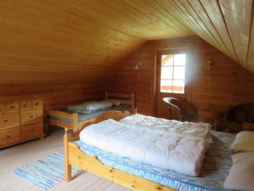 เตียงในห้องที่ Kalvatn Turistsenter