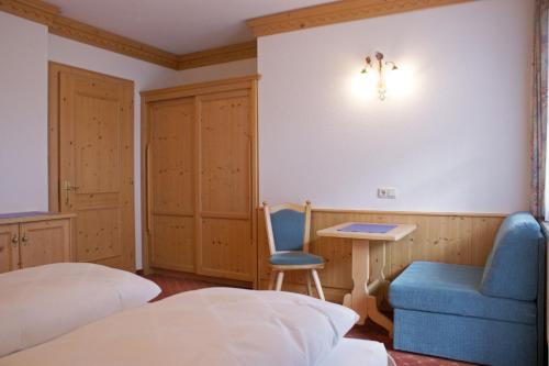 Letto o letti in una camera di Sportapart Garni Mallaun