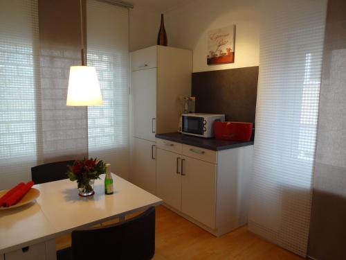 Foto Ferienwohnung Huttenstrasse 22C 4