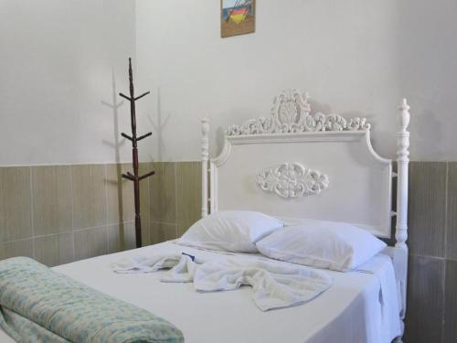 Postel nebo postele na pokoji v ubytování Pousada Trevo Do Barbuda
