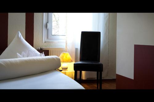 Postel nebo postele na pokoji v ubytování Hotel Riviera