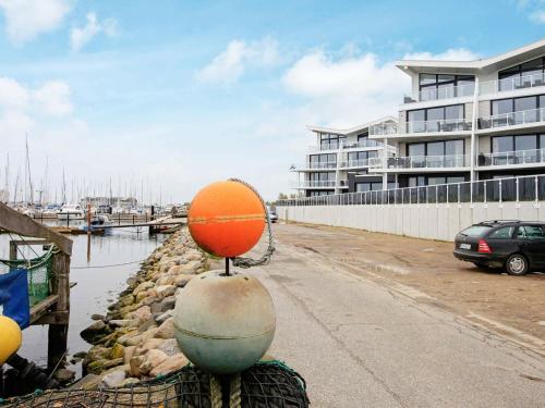 a ball on top of a ball on a wall at 8 person holiday home in Wendtorf in Wendtorf