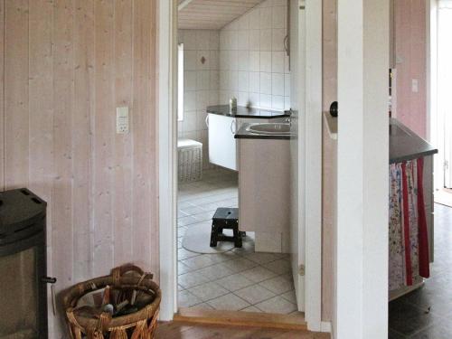 Ванна кімната в Holiday Home Skovløbervej